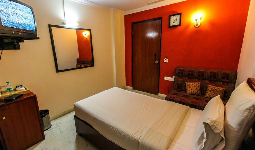 Hotel Pigeon International Bangalore Quarto foto