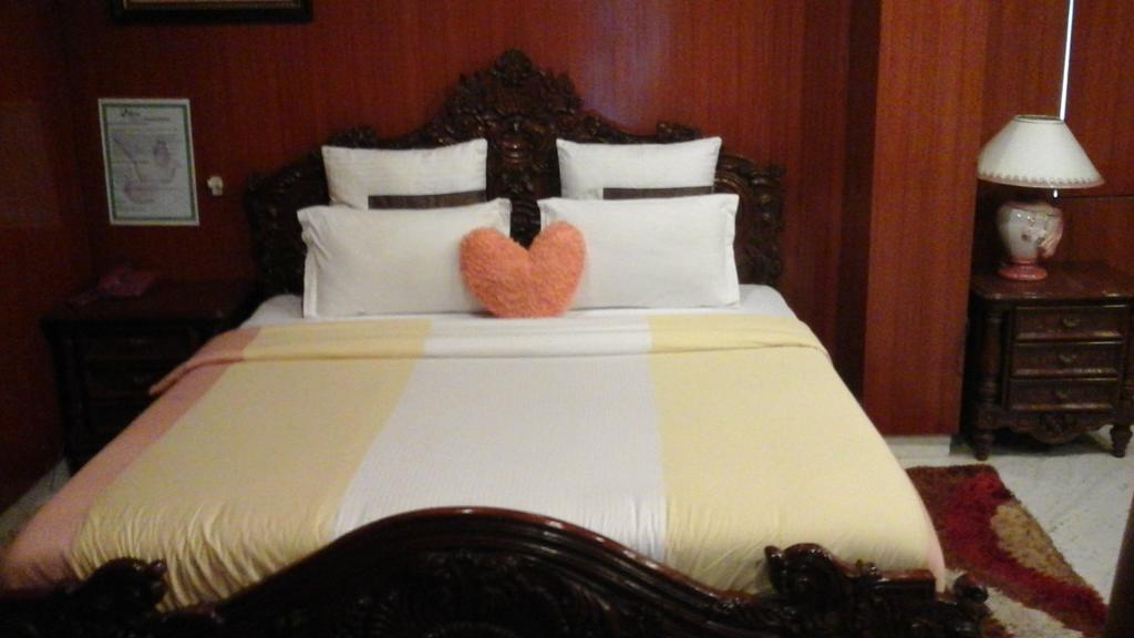 Hotel Pigeon International Bangalore Quarto foto